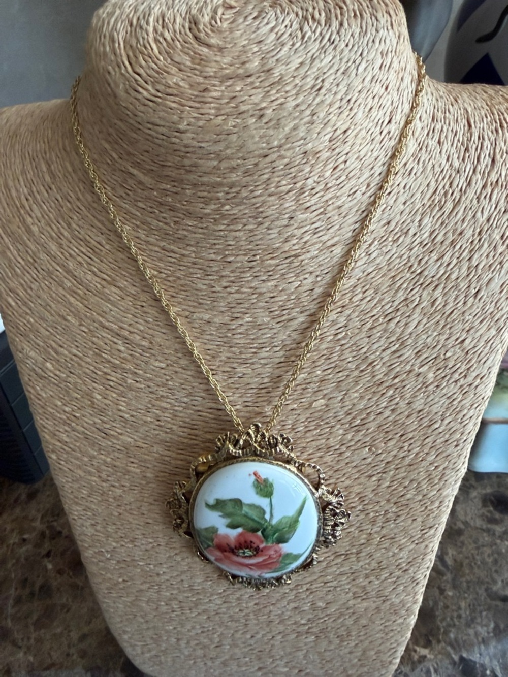 Large porcelain brooch or pendant signed in gold at the bottom peach roses